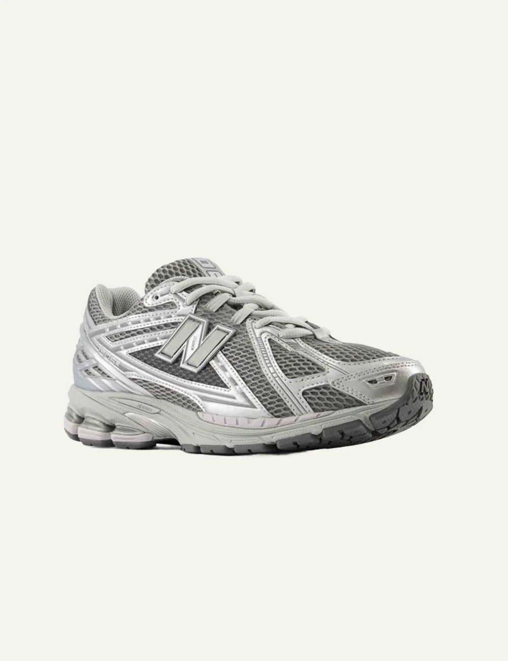 New Balance 1906R women's grey mesh sneakers with silver details front angle view