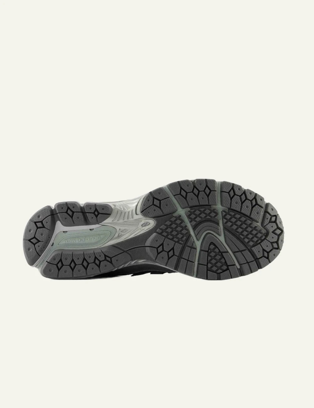 New Balance 1906R women's grey mesh sneakers with silver details sole view