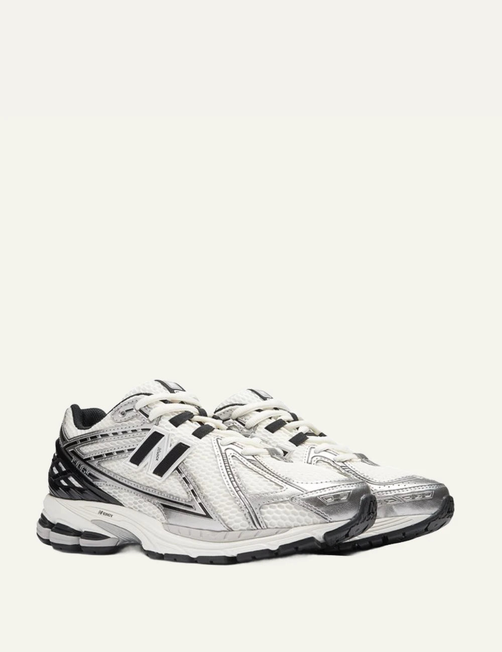 New Balance 1906R women's white mesh sneakers with silver and black details pair view