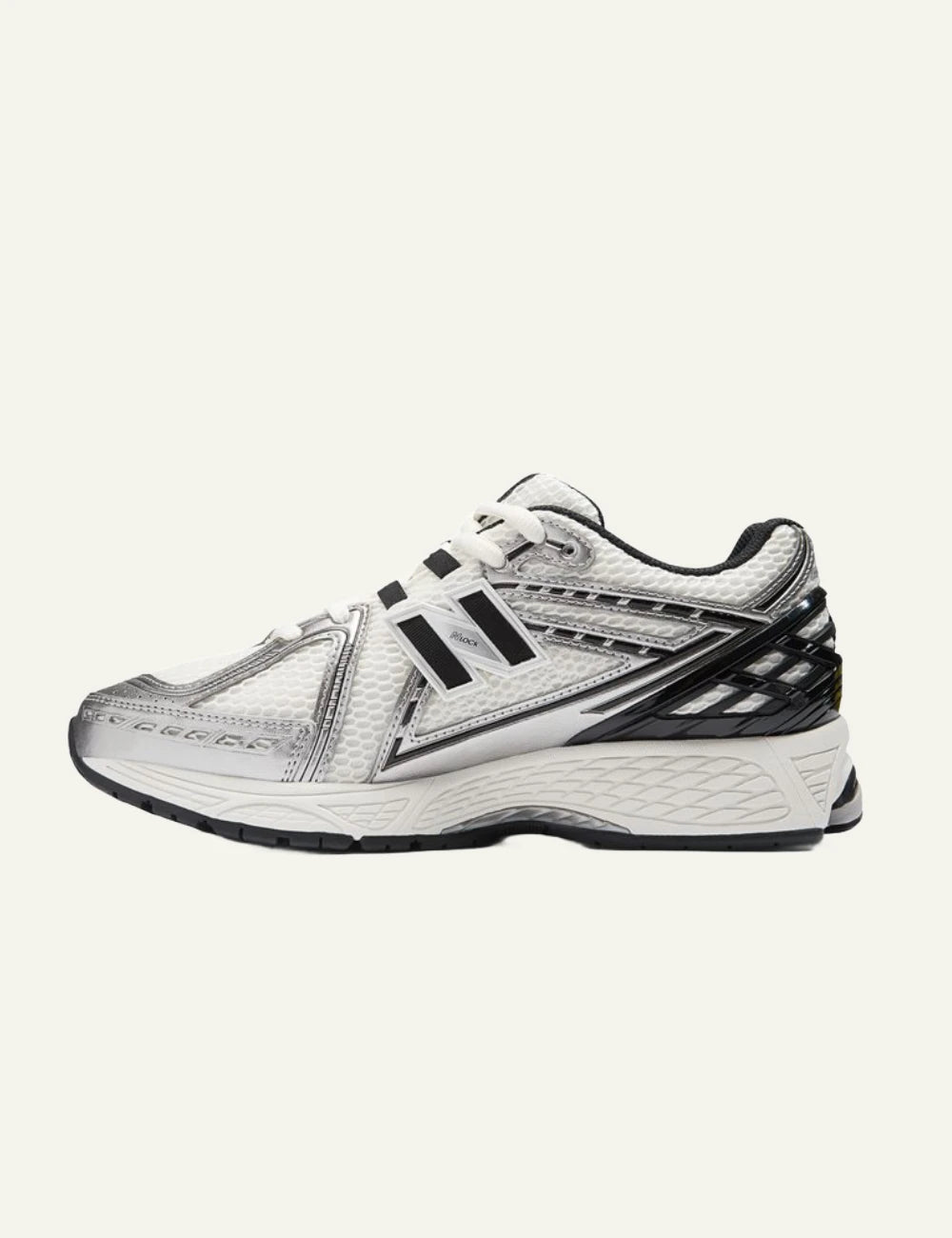 New Balance 1906R women's white mesh sneakers with silver and black details opposite side view