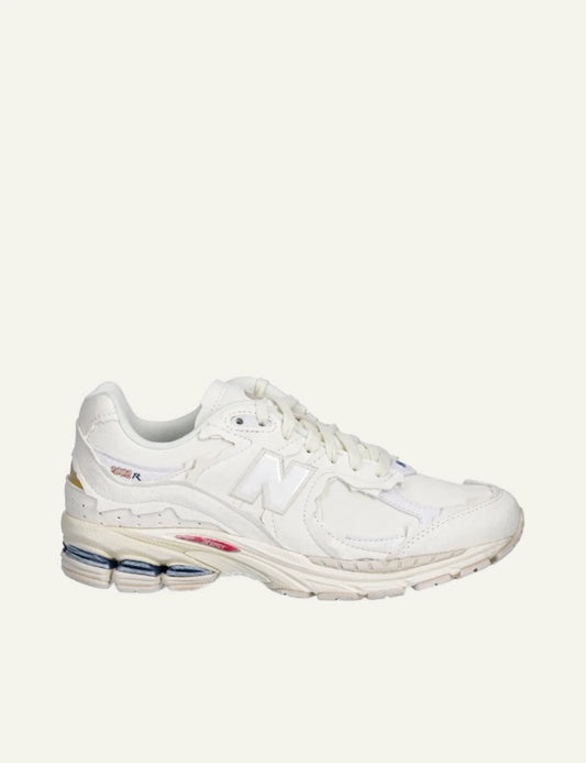 New Balance 2002R beige leather dad sneakers side view