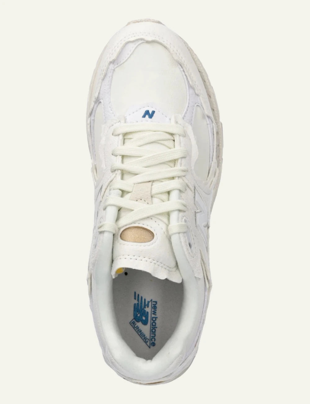 New Balance 2002R beige leather dad sneakers top view