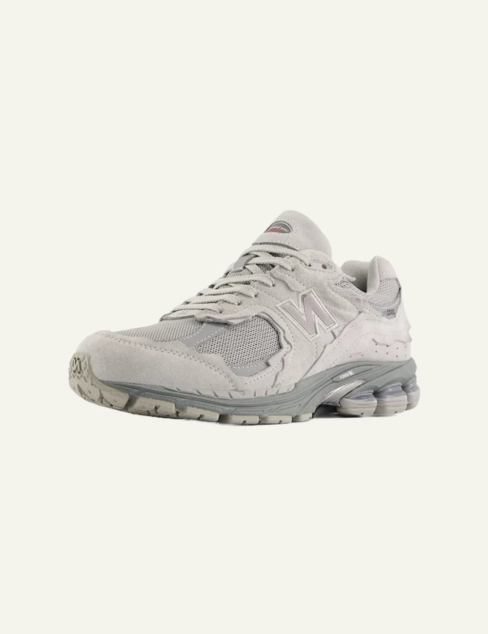 New Balance 2002R grey suede mesh sneakers profil view