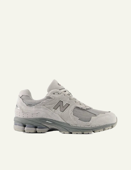New Balance 2002R grey suede mesh sneakers side view