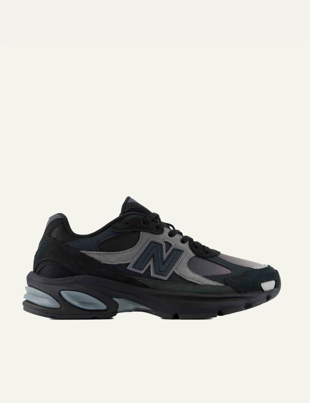 New Balance 2010 men's black mesh and suede sneakers with dark green details side view
