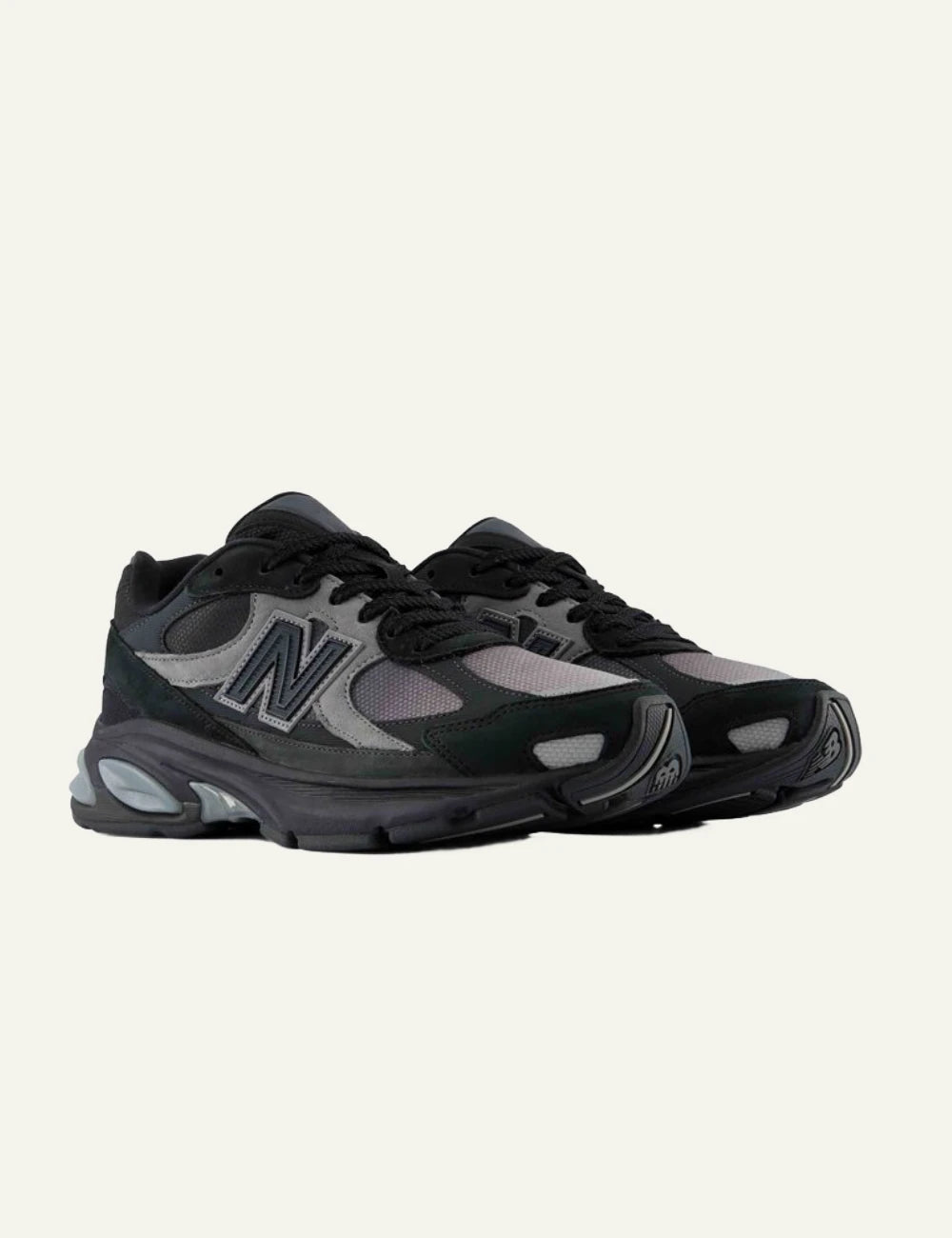 New Balance 2010 men's black mesh and suede sneakers with dark green details pair view
