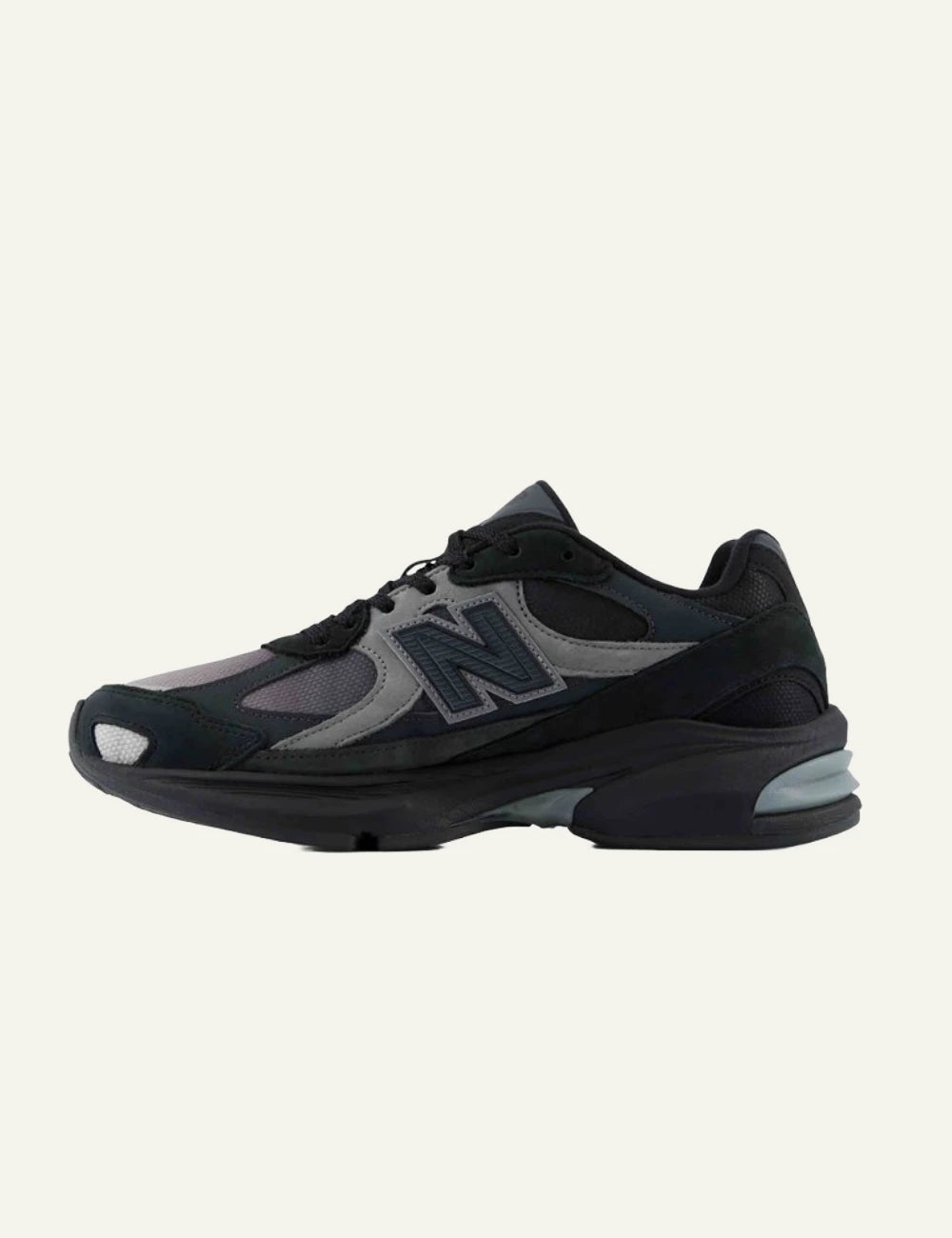New Balance 2010 men's black mesh and suede sneakers with dark green details opposite side view