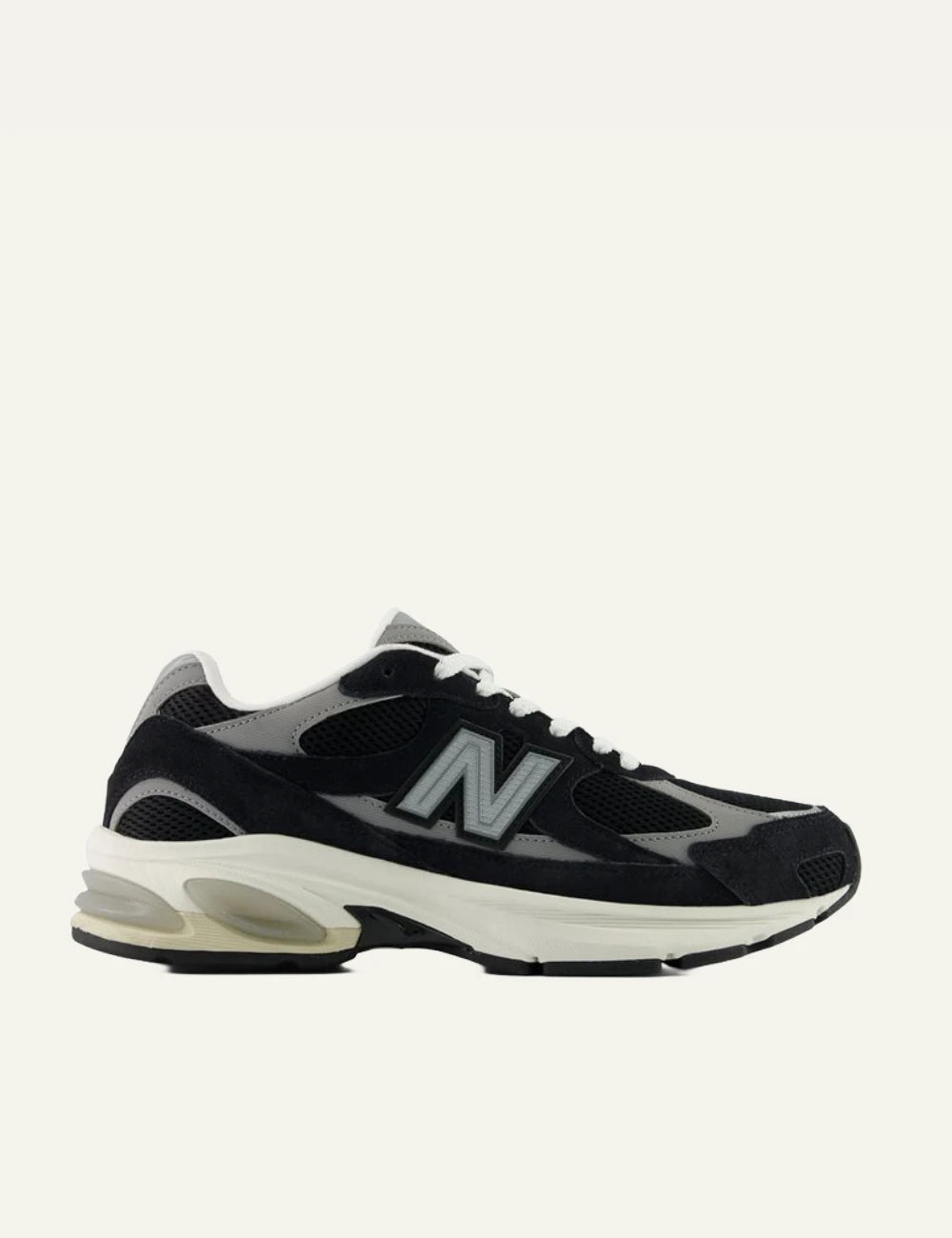 New Balance 2010 men's black mesh and suede sneakers with grey details side view