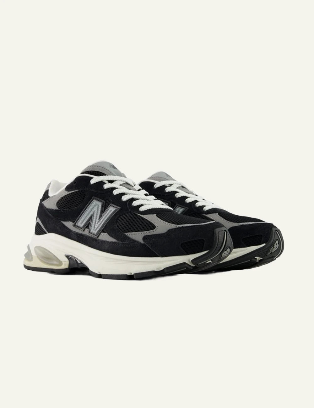 New Balance 2010 men's black mesh and suede sneakers with grey details pair view