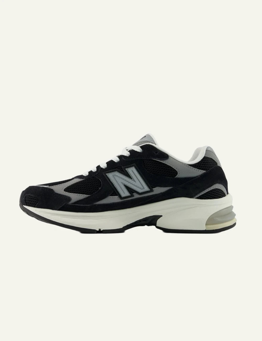 New Balance 2010 men's black mesh and suede sneakers with grey details opposite side view