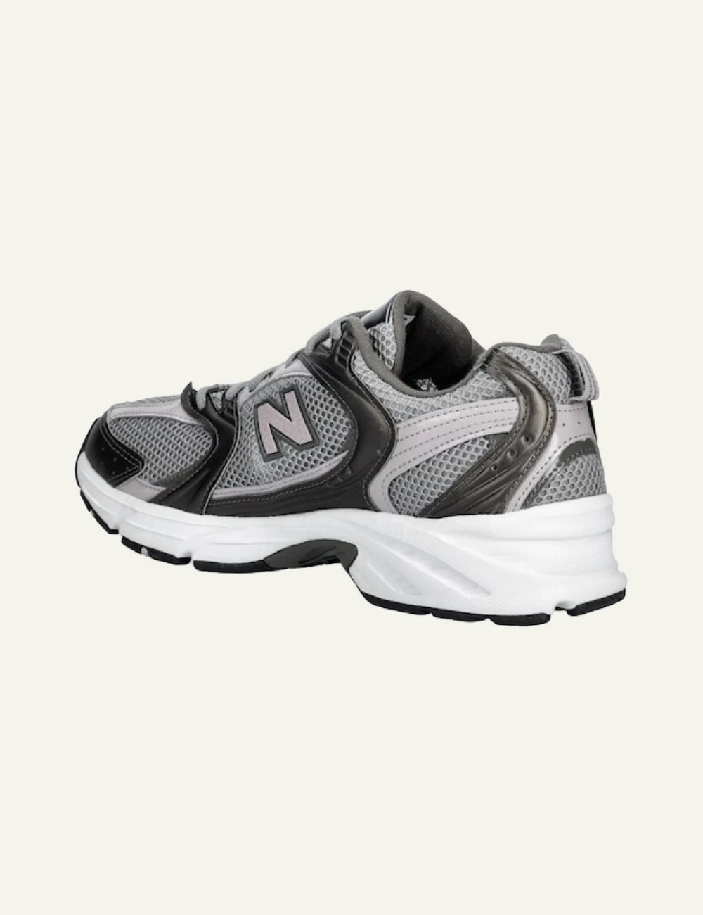 New Balance 530 grey mesh sneakers angled back view