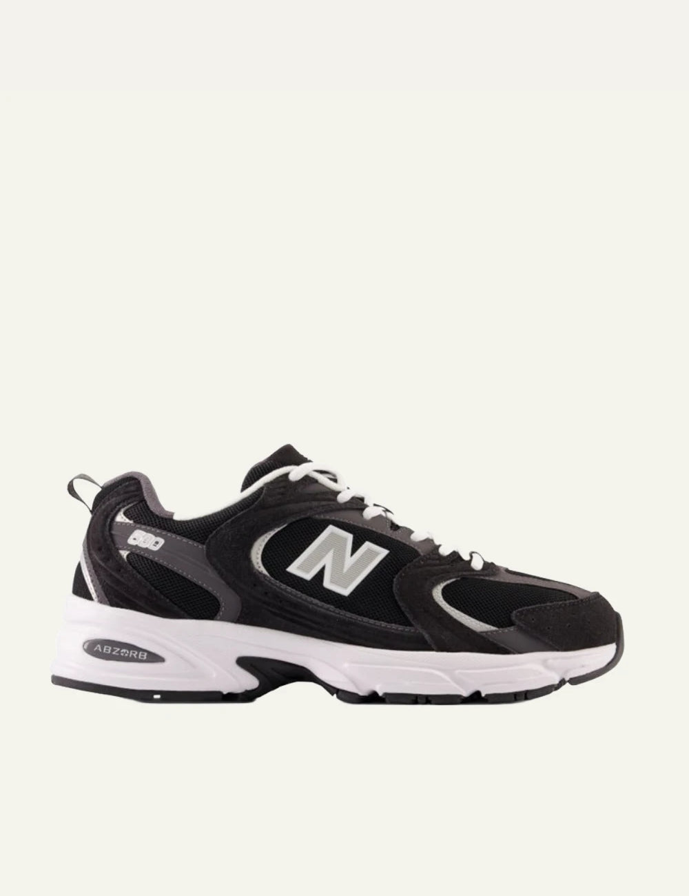 New Balance 530 women's black mesh and suede sneakers side view