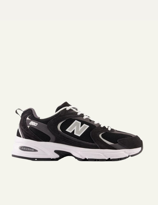 New Balance 530 women's black mesh and suede sneakers side view