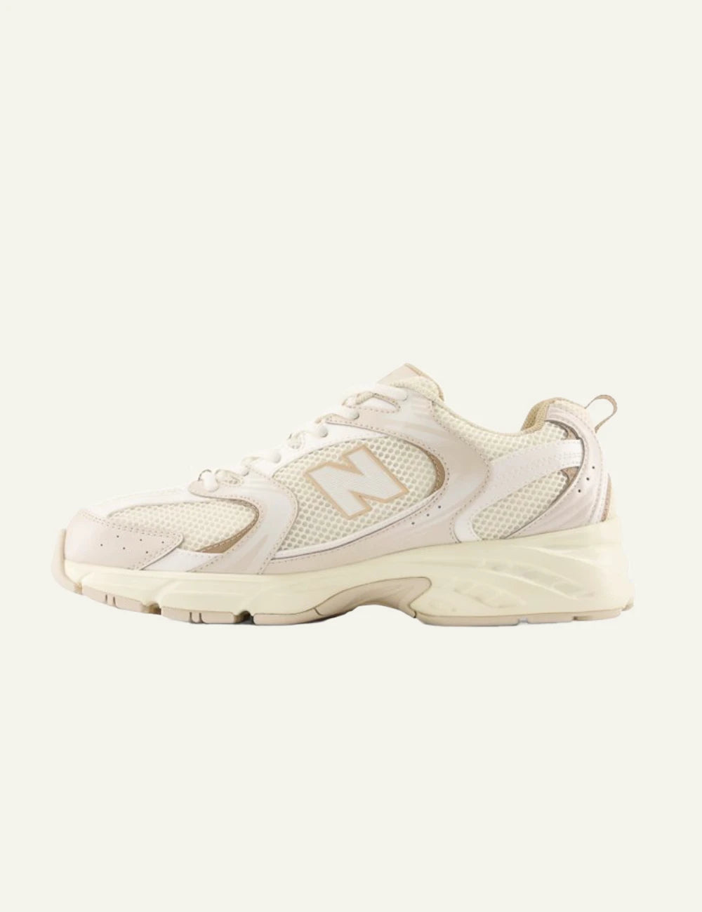 New Balance 530 women's cream mesh sneakers with beige detail sopposite side view
