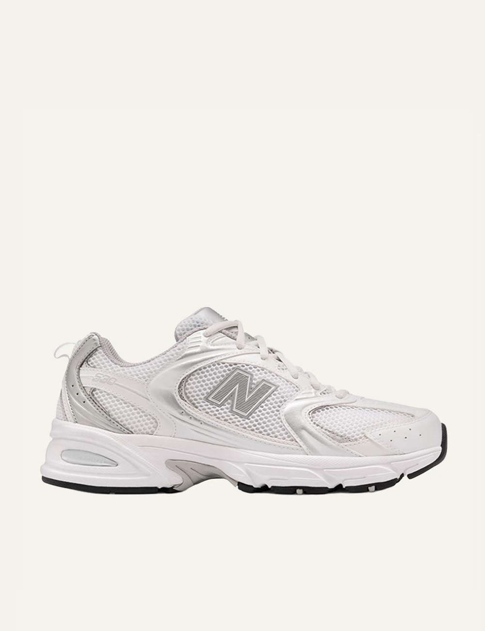 New Balance 530 women's white mesh sneakers with silver details side view