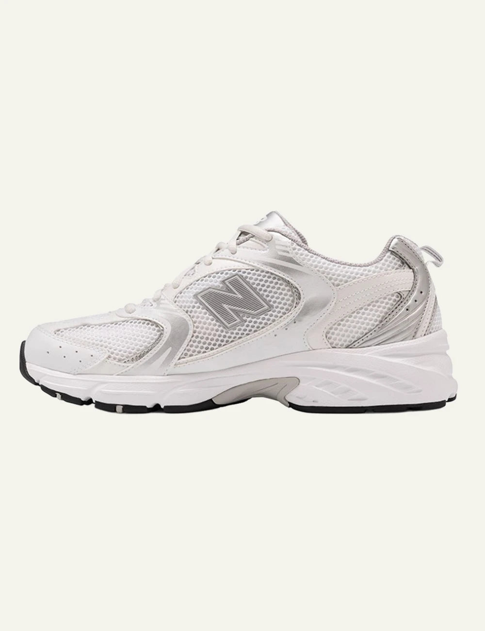 New Balance 530 women's white mesh sneakers with silver details opposite side view