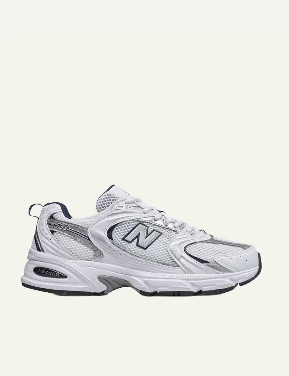 New Balance 530 women's white mesh sneakers with silver and navy details side view