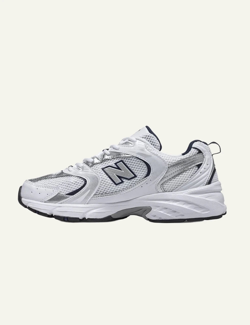 New Balance 530 women's white mesh sneakers with silver and navy details opposite side view