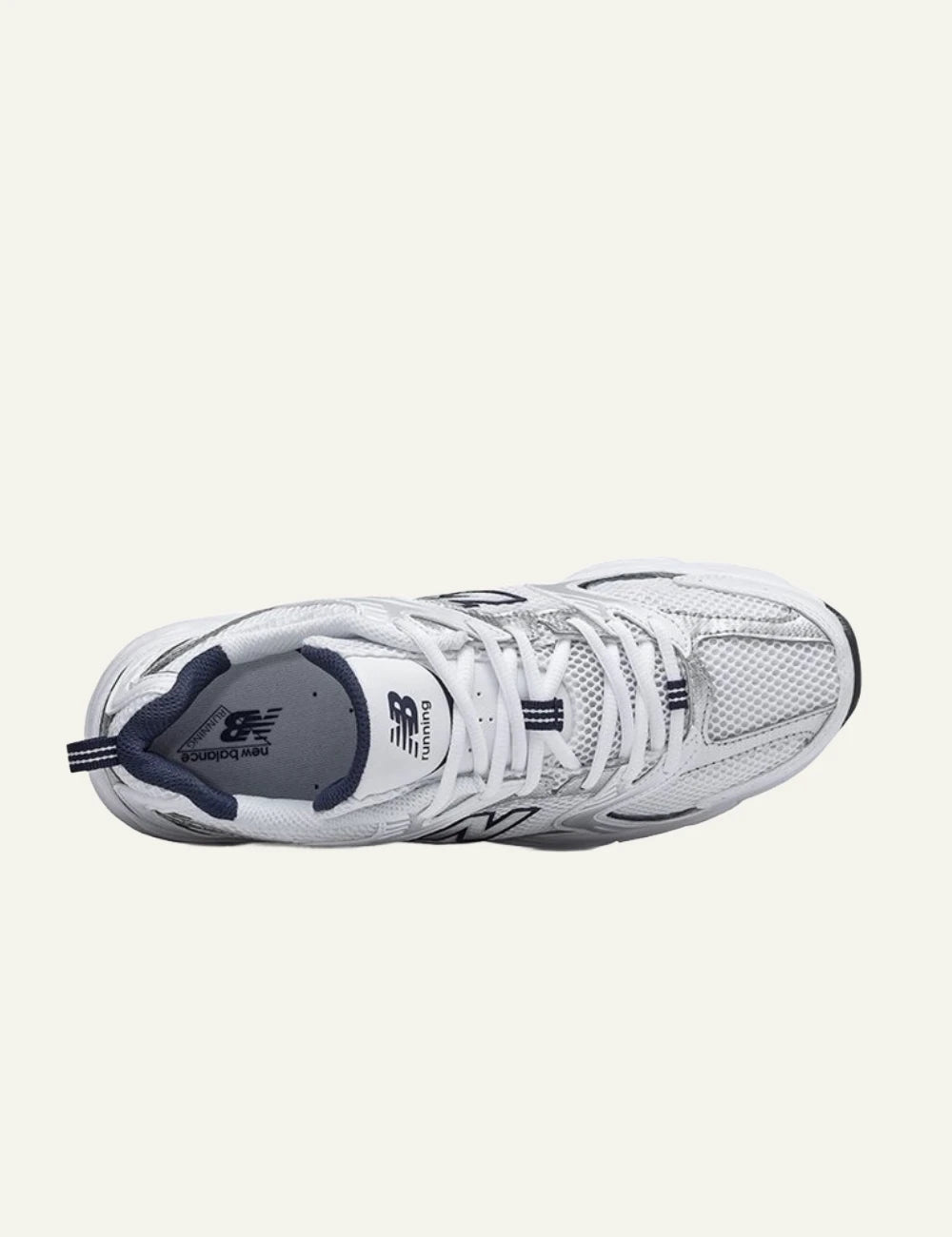 New Balance 530 women's white mesh sneakers with silver and navy details top view
