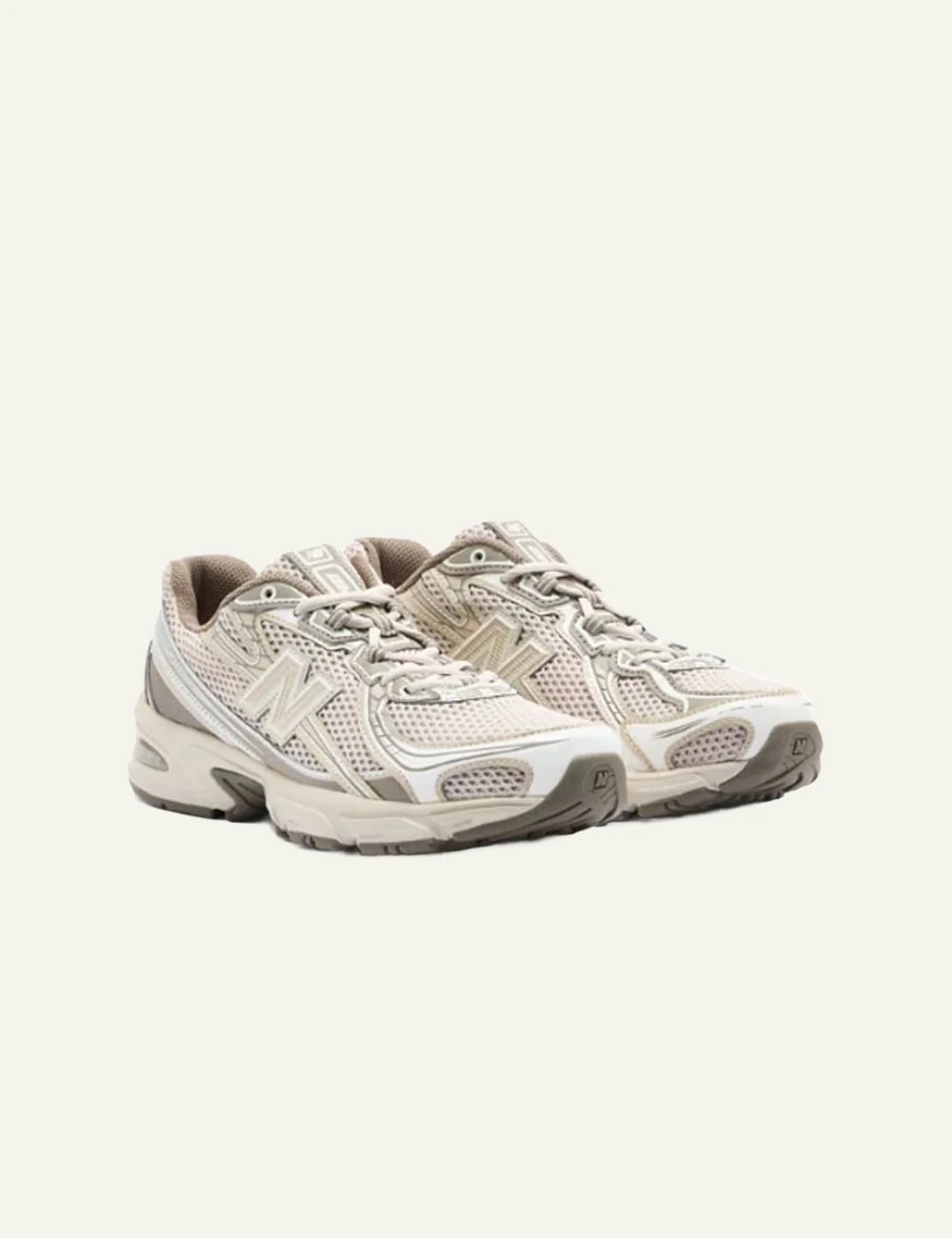 New Balance 740 beige mesh sneakers angled view