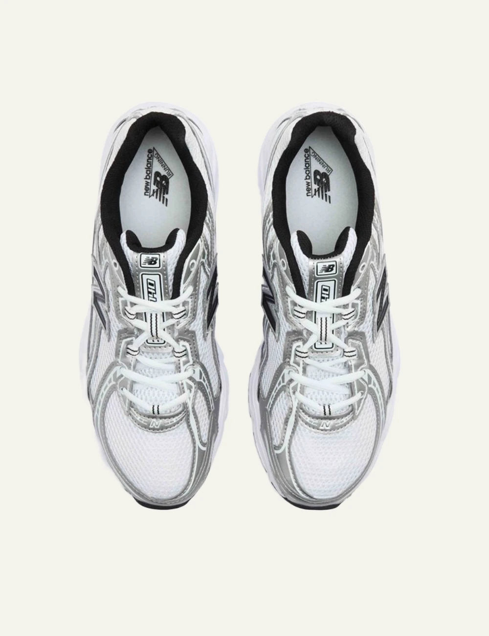 New Balance 740 women's white mesh sneakers with silver and black details top view