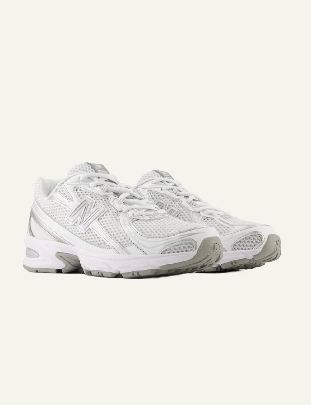 New Balance 740 women's white mesh sneakers with silver details pair view
