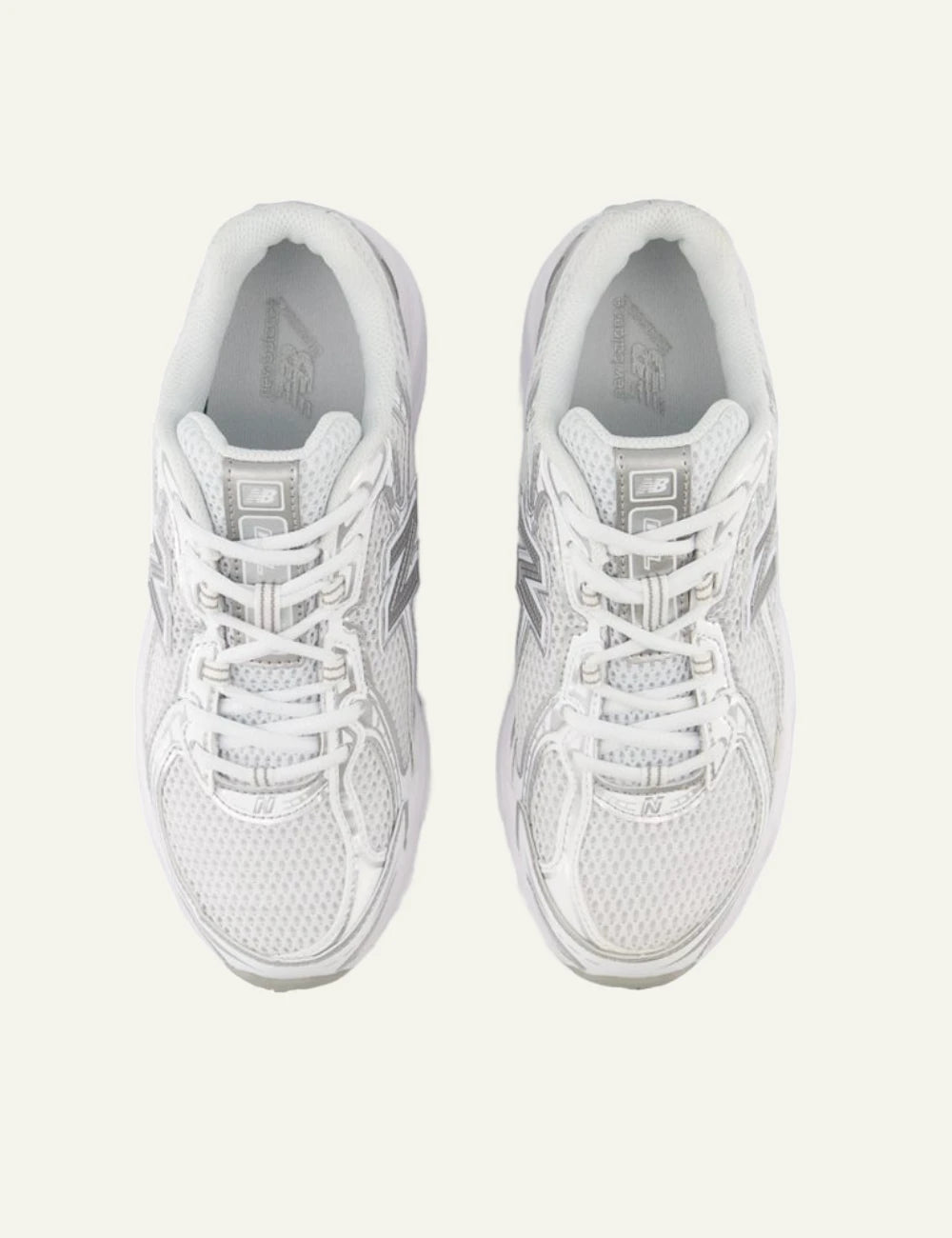 New Balance 740 women's white mesh sneakers with silver details top view
