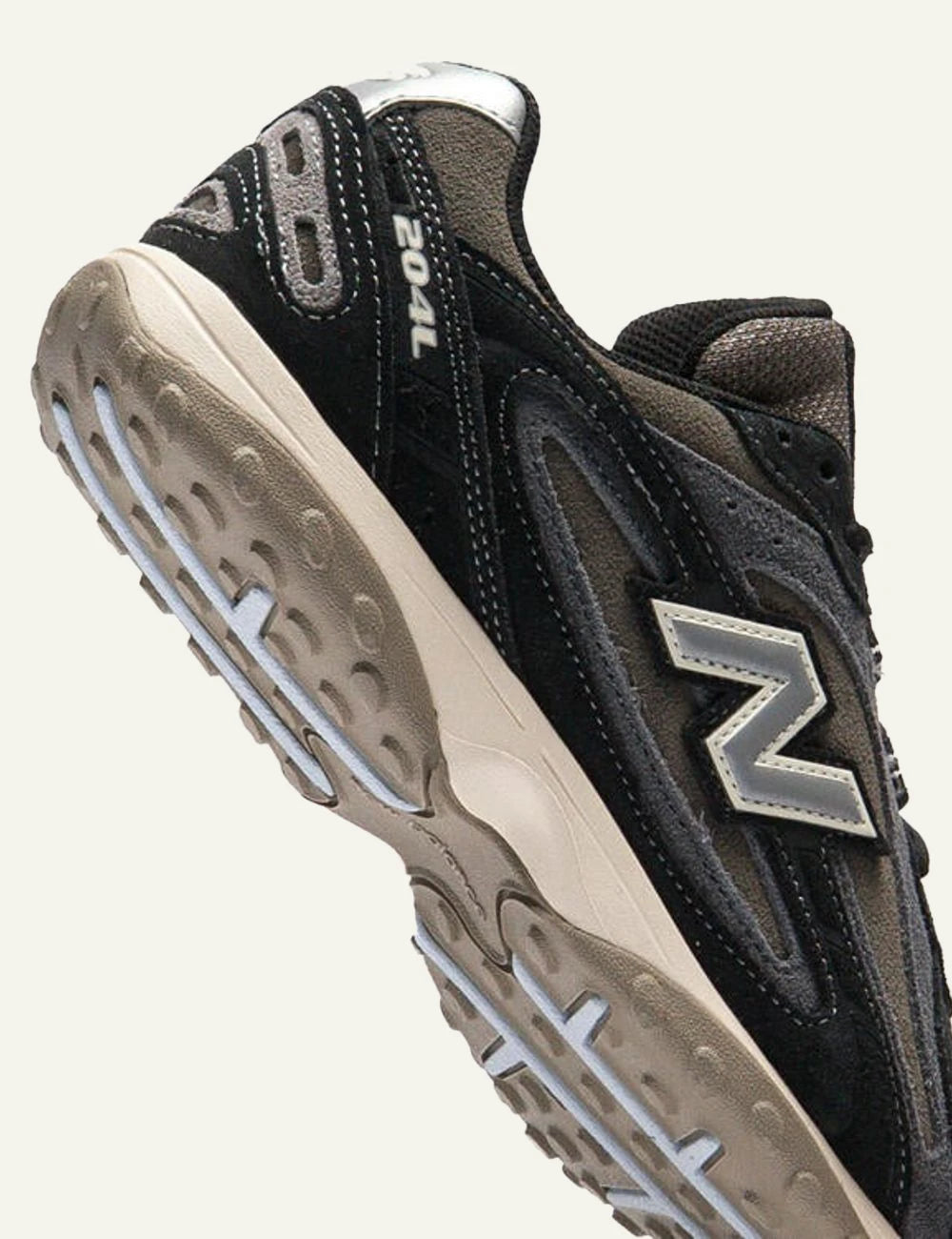New Balance Classics Brown sneakers suede mesh angled view