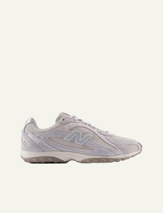 New Balance Classics Pink sneakers suede mesh side view