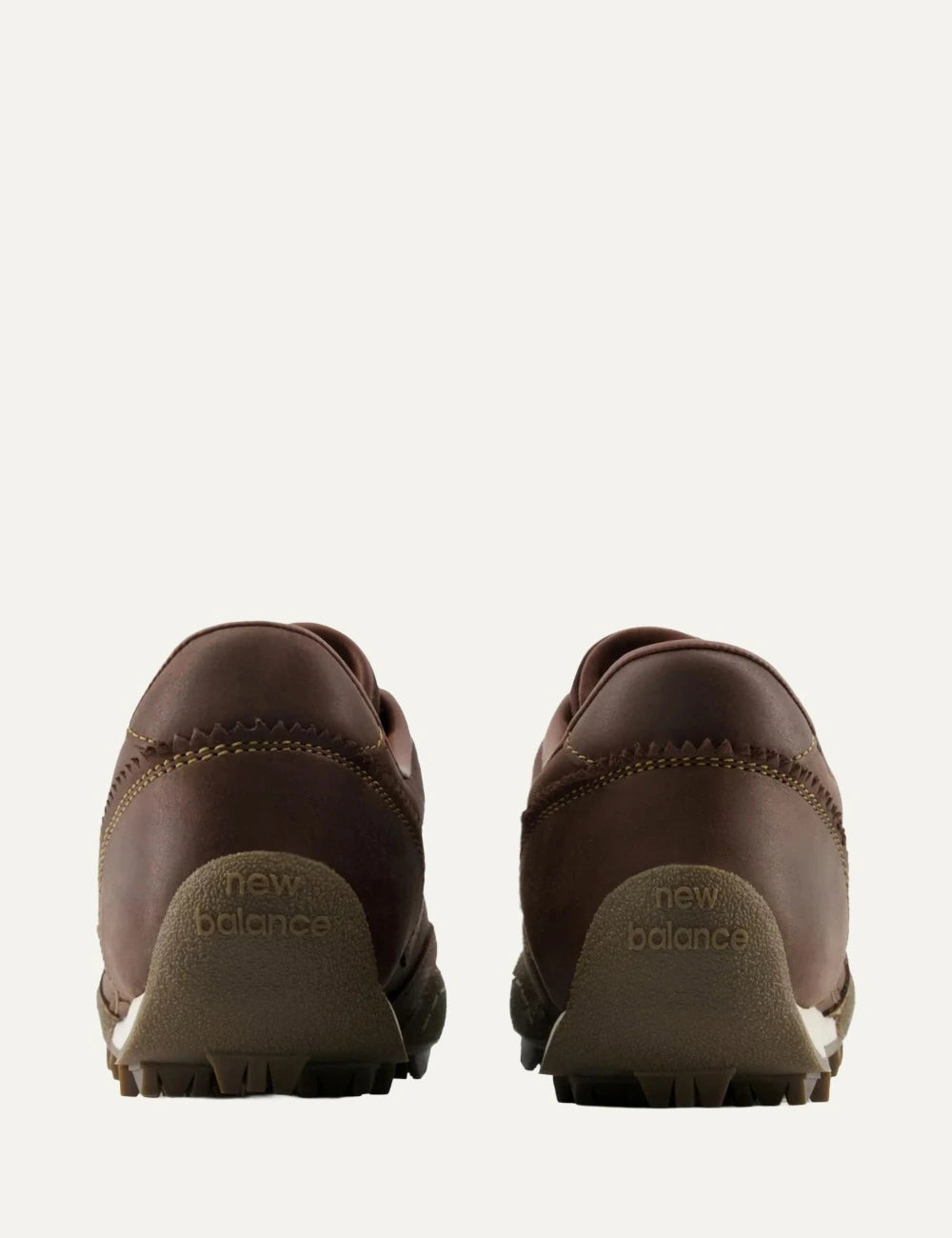New Balance Gator Run women's dark brown leather sneakers with green laces back view