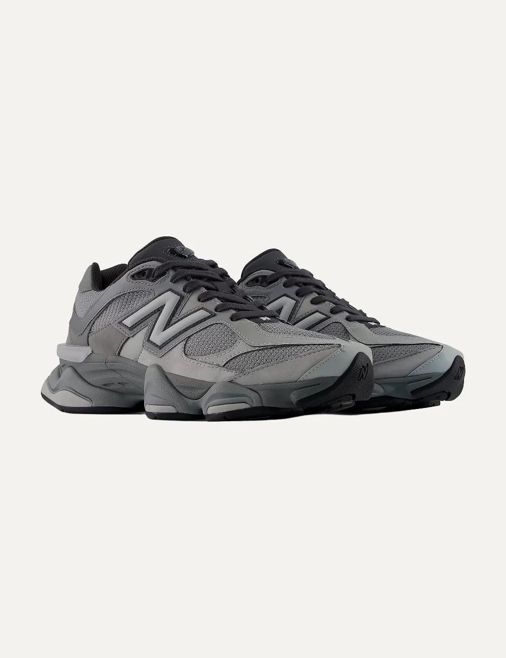 New Balance unisex dark grey suede and mesh sneakers with ABZORB cushioning angled