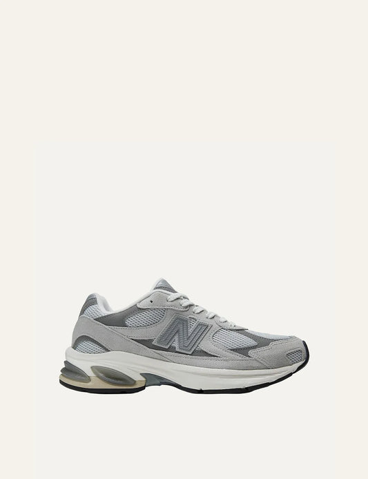 New Balance unisex light grey suede mesh sneakers with ABZORB cushioning