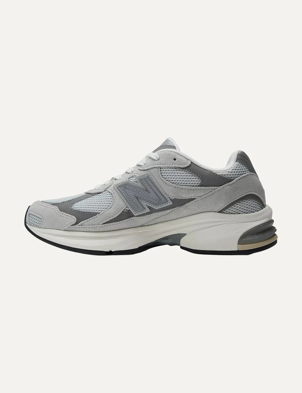 New Balance unisex light grey suede mesh sneakers with ABZORB cushioning profile
