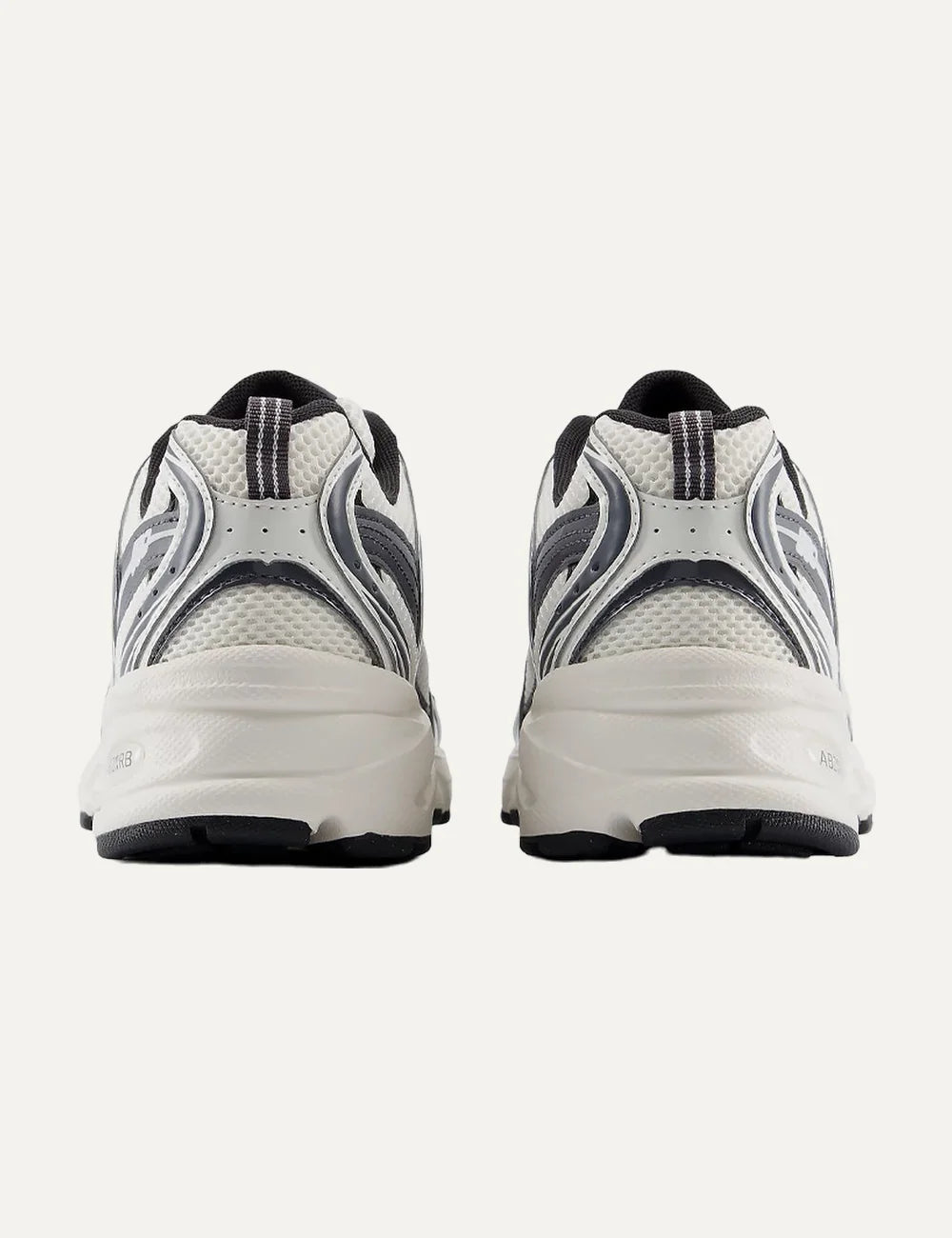 New Balance unisex white and dark grey mesh sneakers with ABZORB cushioning back