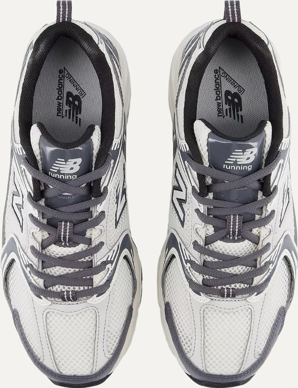 New Balance unisex white and dark grey mesh sneakers with ABZORB cushioning top