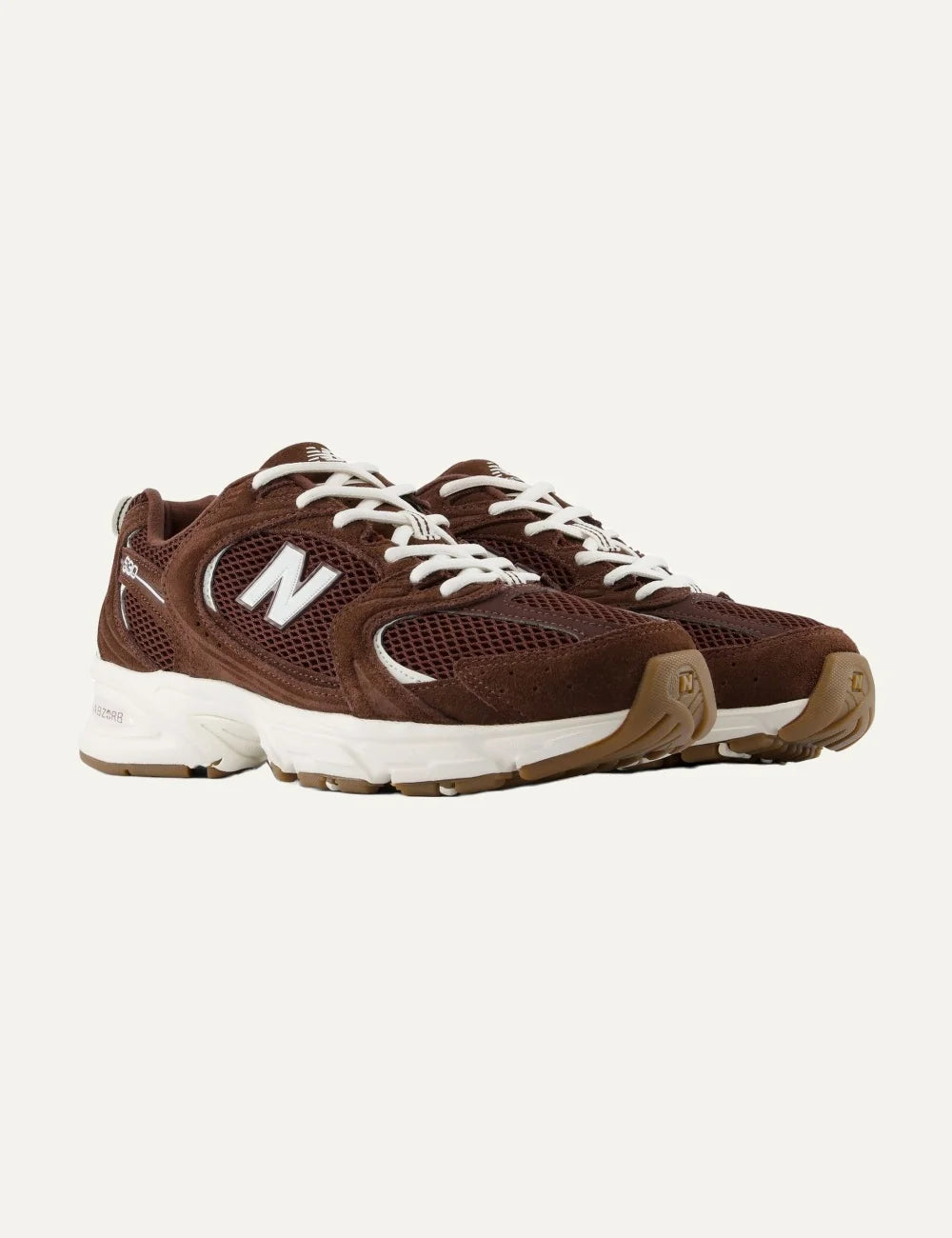  New Balance women's leather and mesh sneakers in dark brown angled