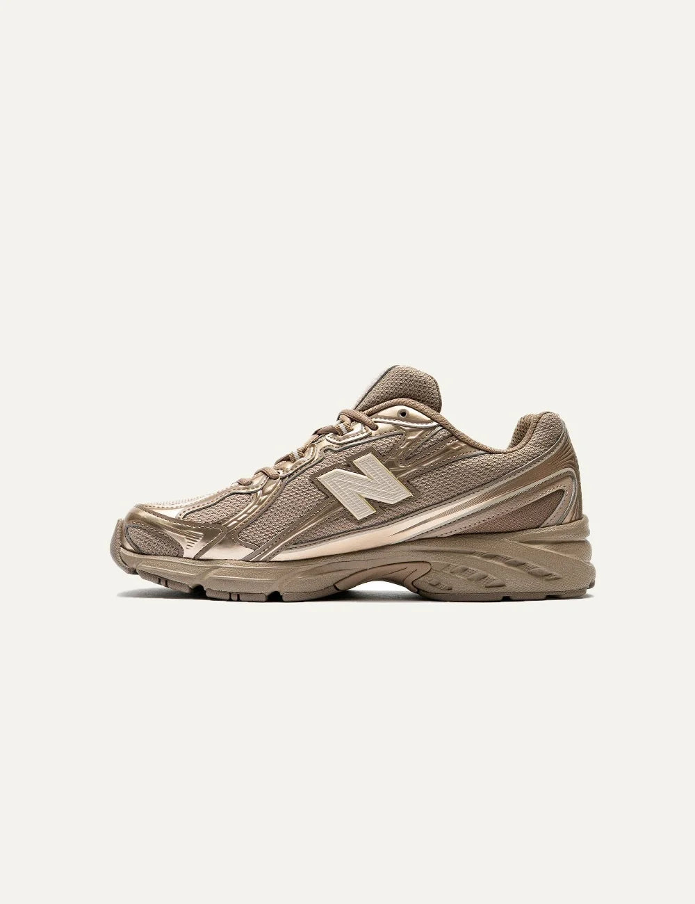 New Balance women's mesh sneakers in brown with metallic details profile