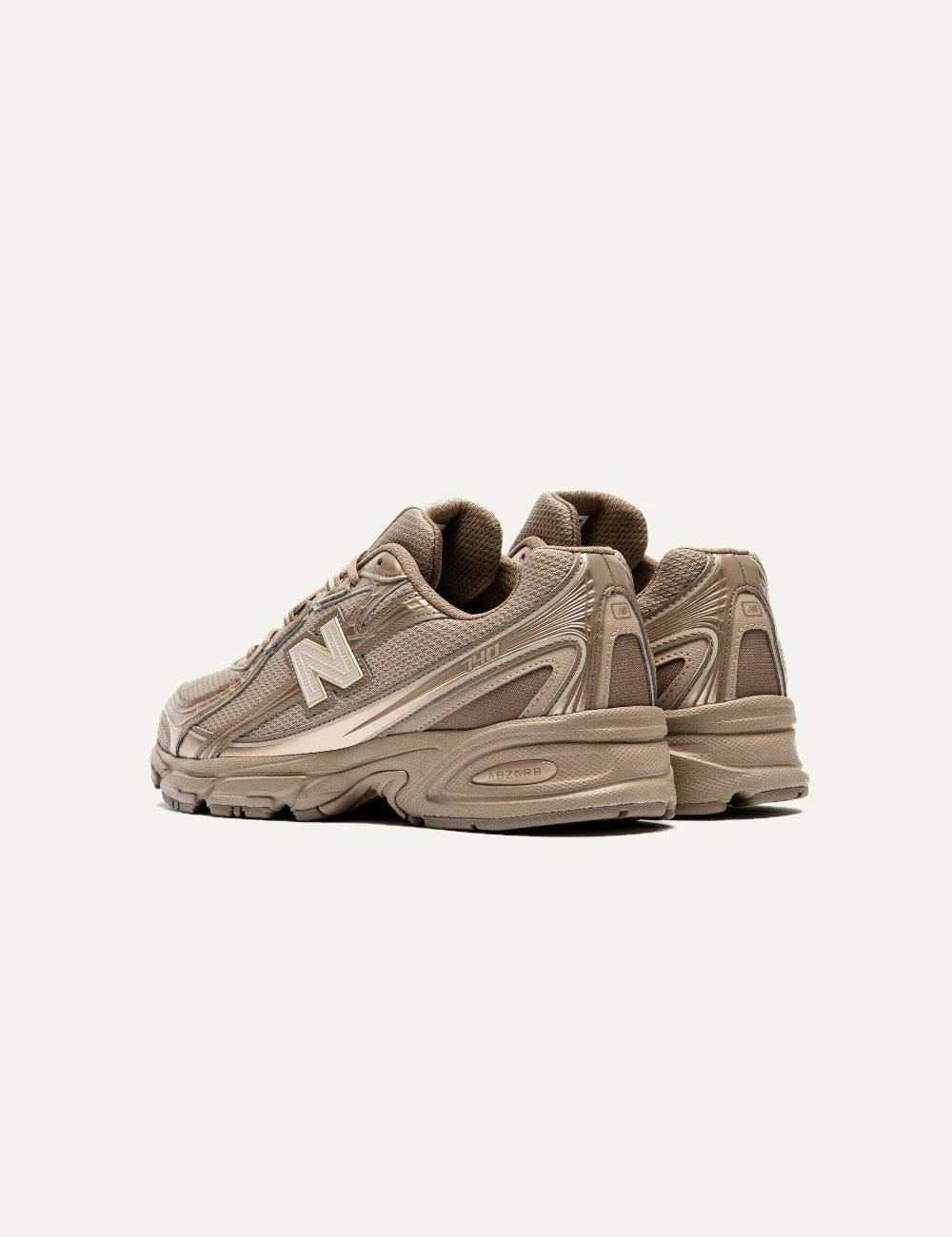 New Balance women's mesh sneakers in brown with metallic details back