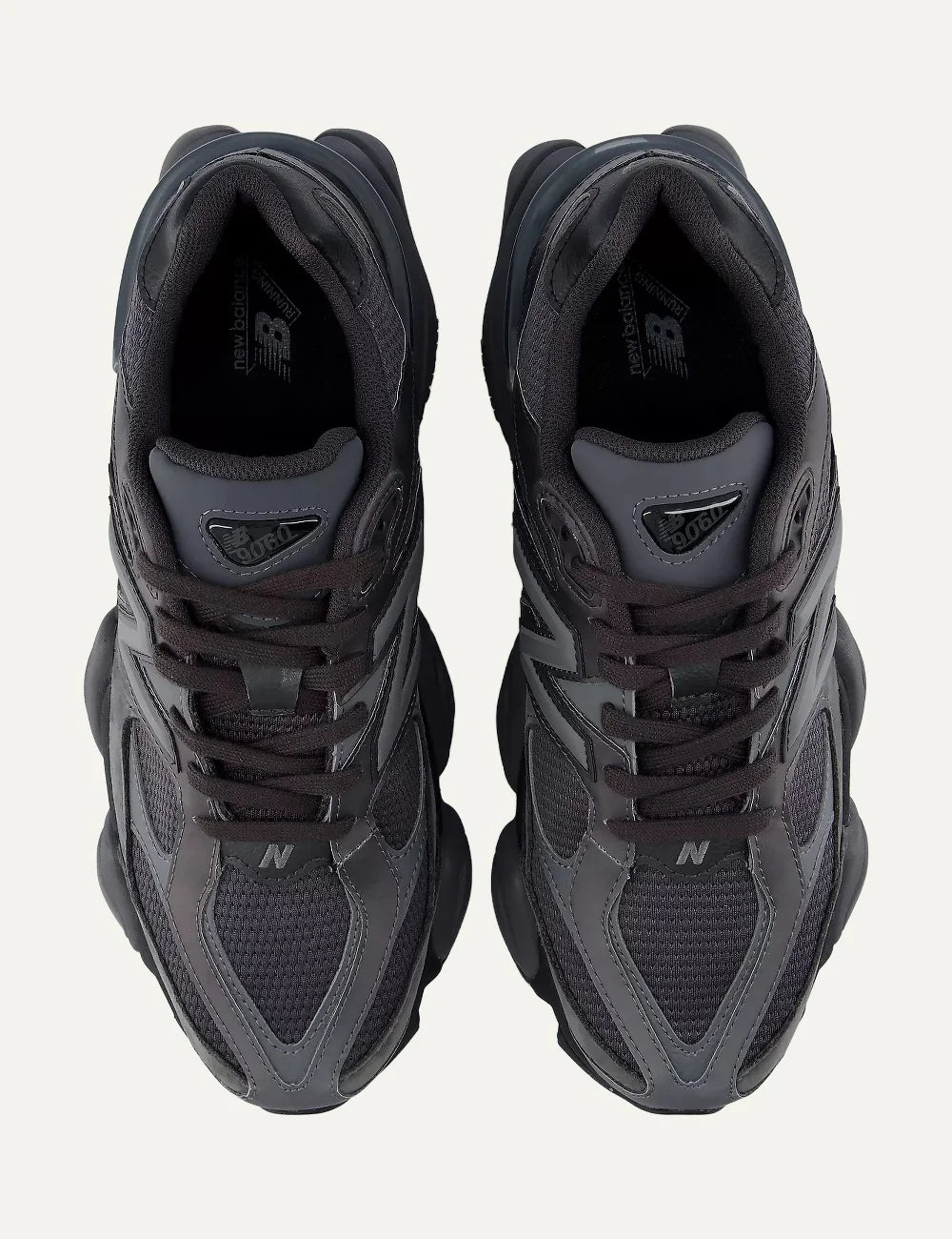 New Balance women's mesh and suede sneakers in dark grey and black top