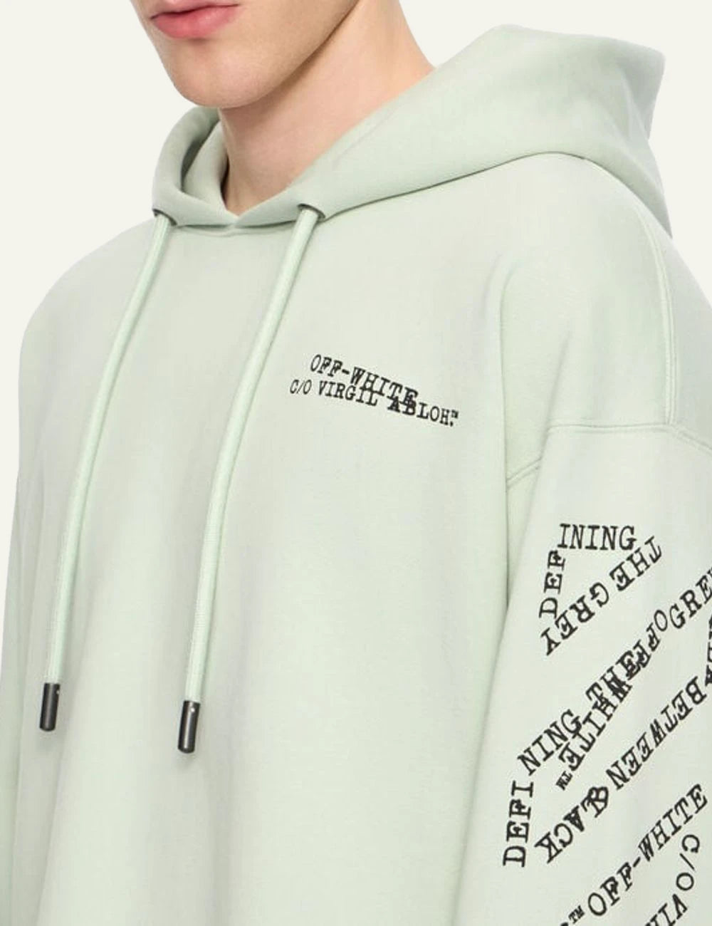 Off White hoodie light green arrow logo typographic sleeves front detail view