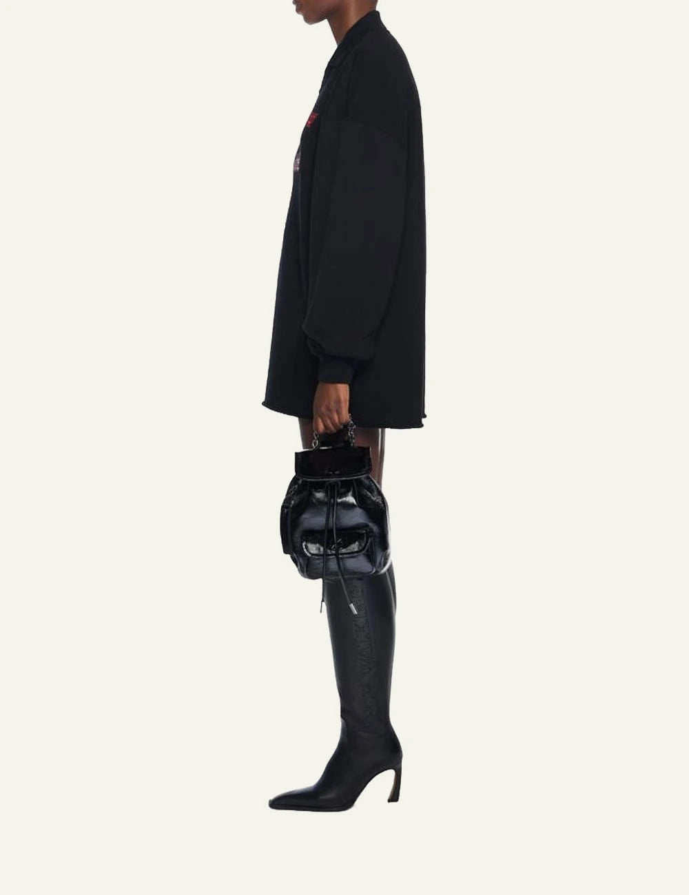 Off-White leather backpack black glossy chain strap flap logo model view