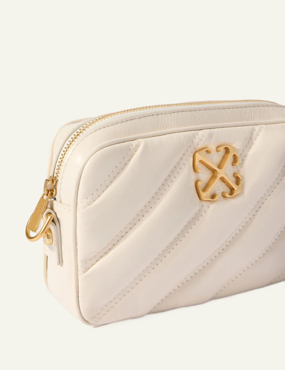Off White OWNN18EC99LEA001 quilting camera bag dust beige leather gold logo side detail view