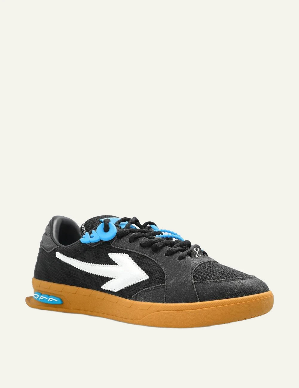 Off-White sneakers black arrow logo gum sole blue detail angled view