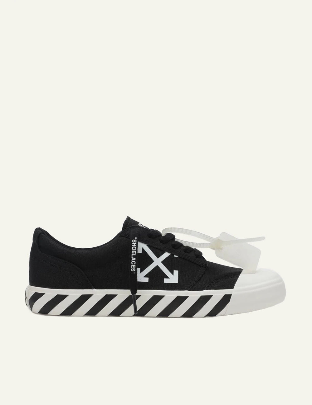 Off-White vulcanized sneakers black canvas arrows logo side view