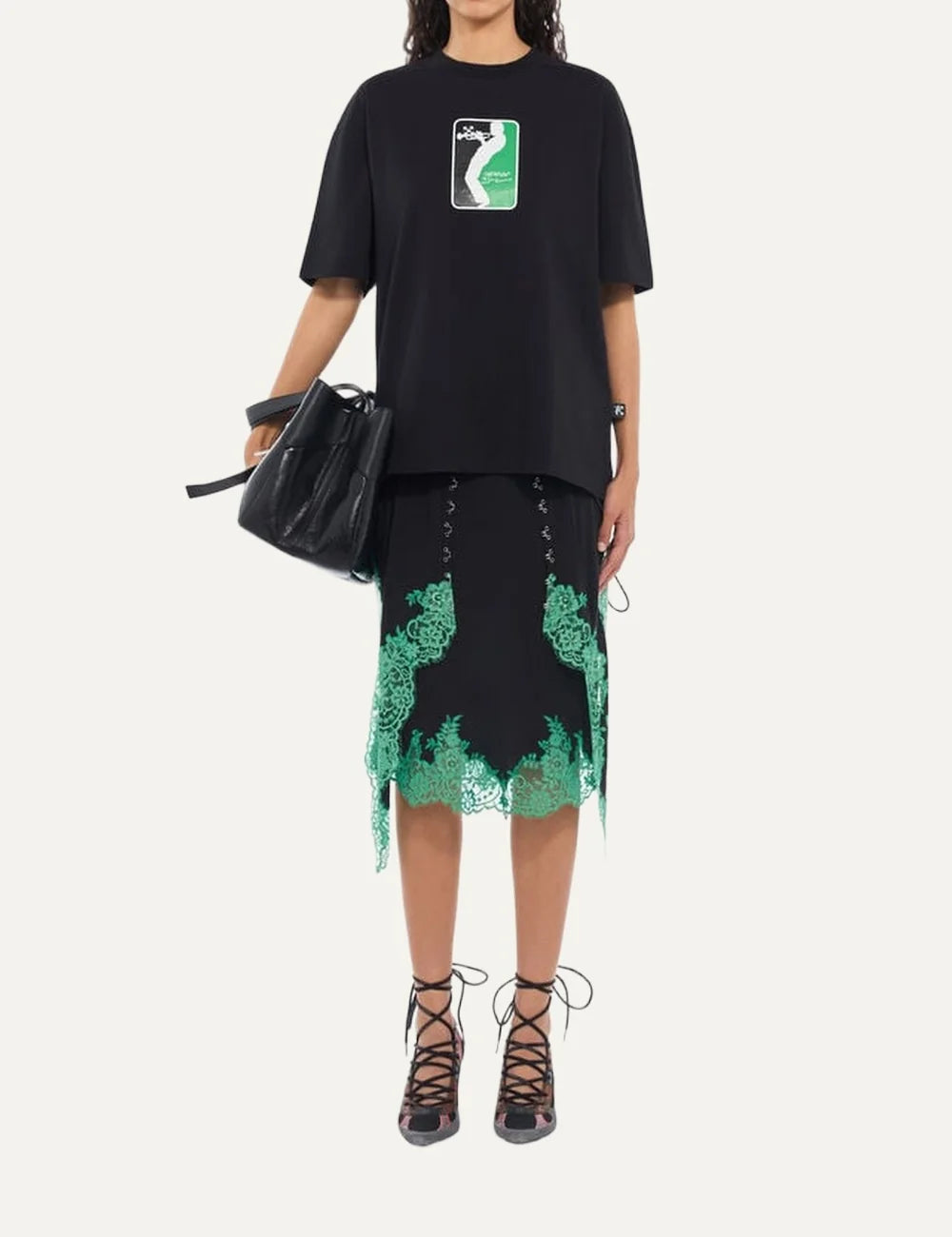 Off-White women's black oversized Mr. Davis League Skate T-shirt with crew neck, short sleeves and green, black and white trumpet-player graphic on the chest full body
