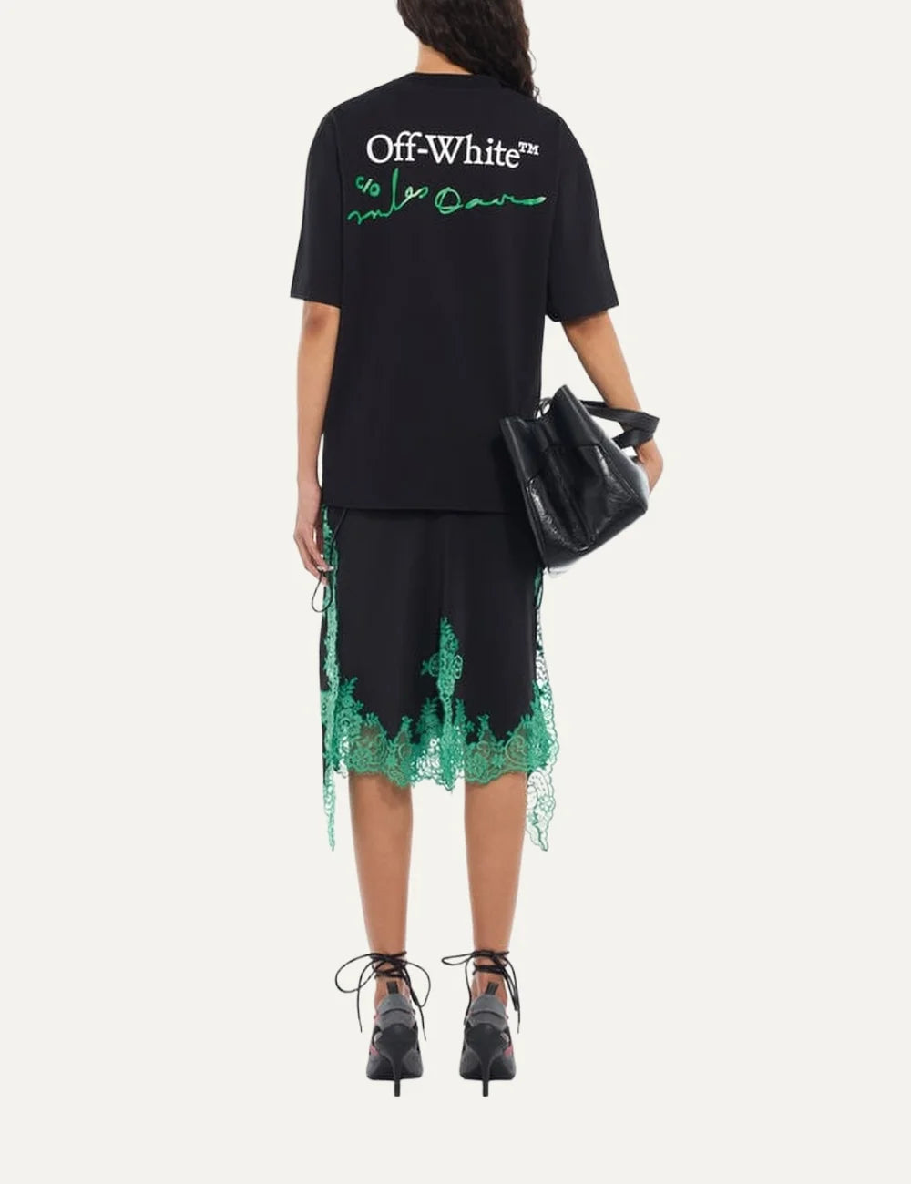Off-White women's black oversized Mr. Davis League Skate T-shirt with crew neck, short sleeves and green, black and white trumpet-player graphic on the chest back