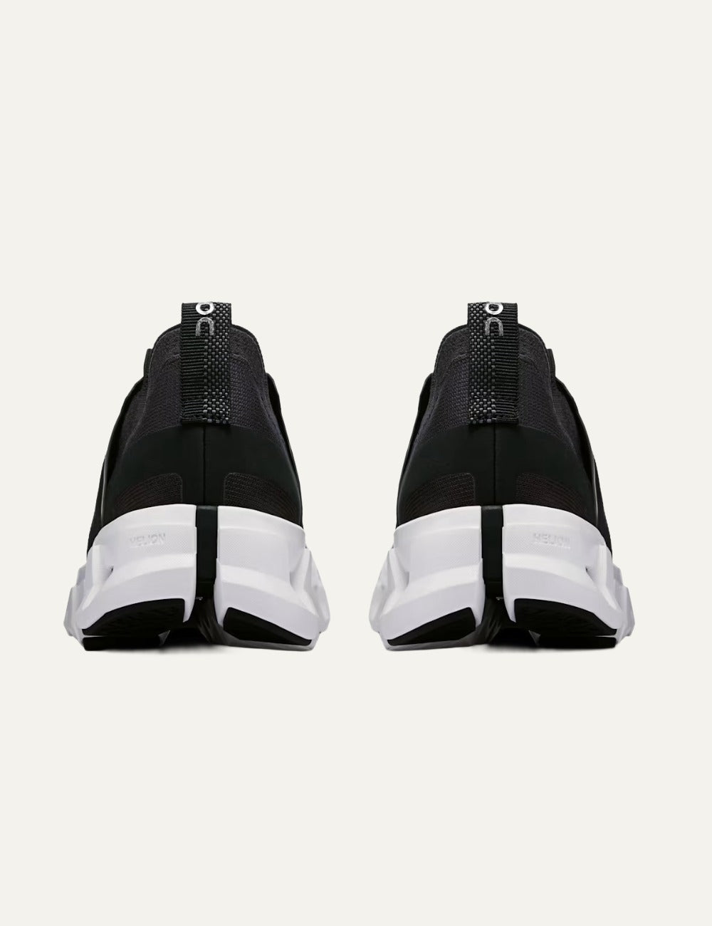 On black men's running shoes with CloudTec cushioning and white sole back
