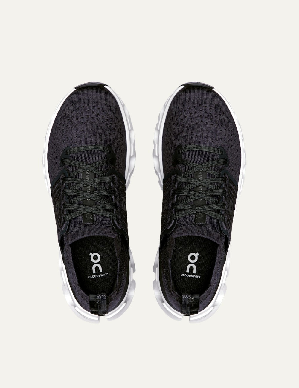 On black men's running shoes with CloudTec cushioning and white sole front