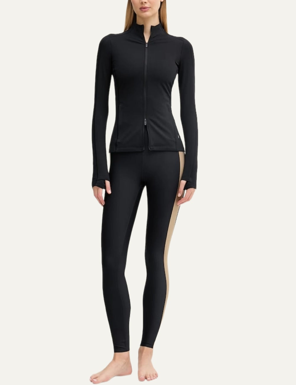 On black women's fitted zip-up sports jacket with fleece lining full body