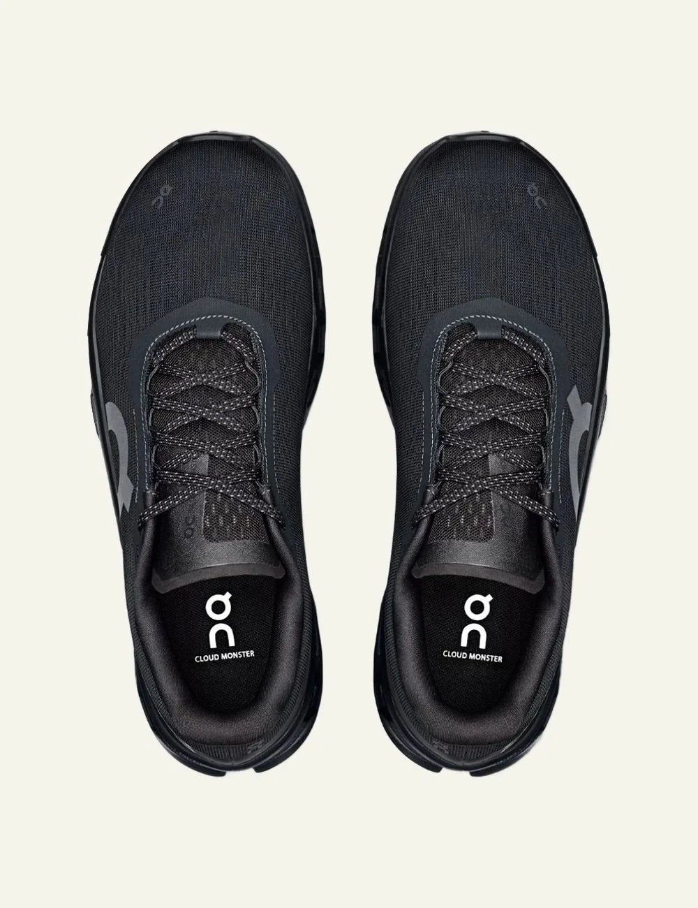 On Cloudmonster Running Sneakers Total Black top View